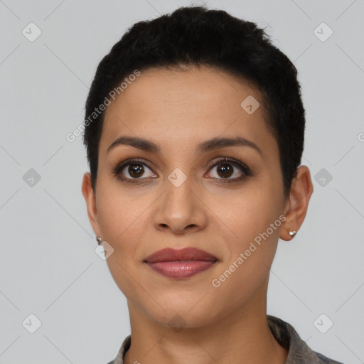 Joyful latino young-adult female with short  black hair and brown eyes