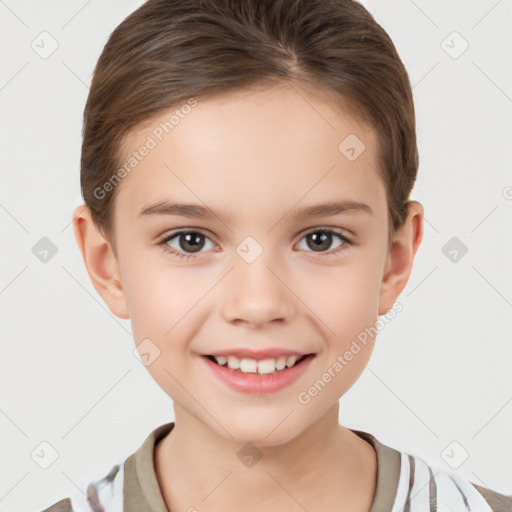 Joyful white child female with short  brown hair and brown eyes