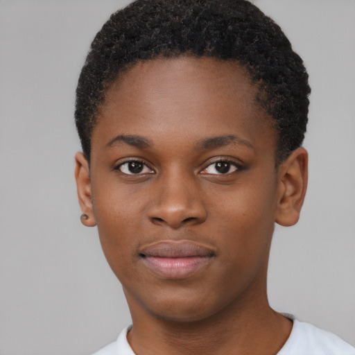 Joyful black young-adult male with short  brown hair and brown eyes