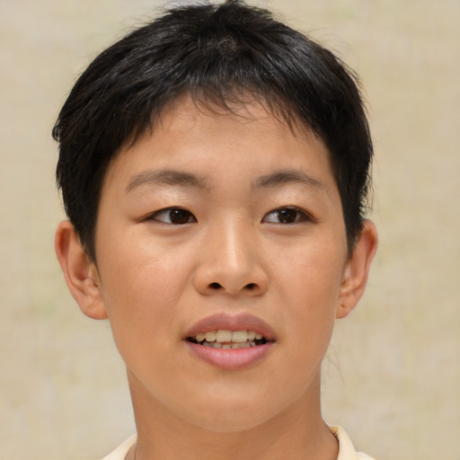 Joyful asian young-adult female with short  brown hair and brown eyes