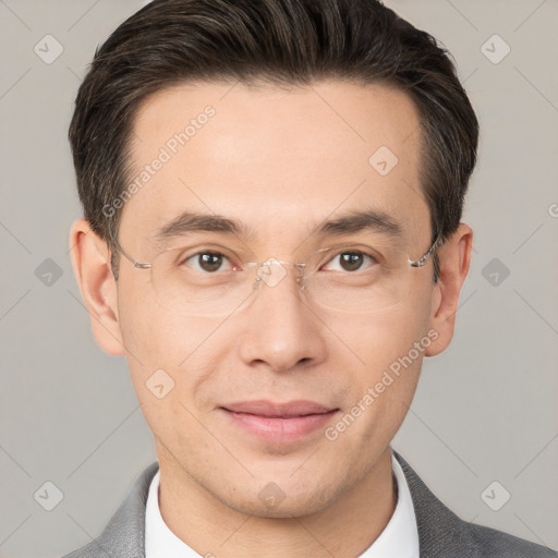 Joyful white adult male with short  brown hair and brown eyes