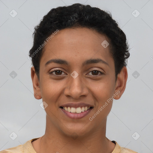 Joyful latino young-adult female with short  brown hair and brown eyes