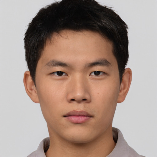 Neutral asian young-adult male with short  brown hair and brown eyes
