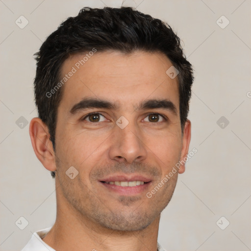 Joyful white young-adult male with short  black hair and brown eyes