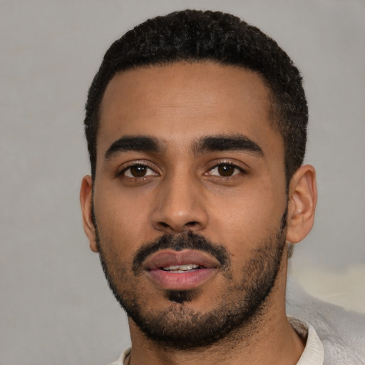 Neutral black young-adult male with short  black hair and brown eyes