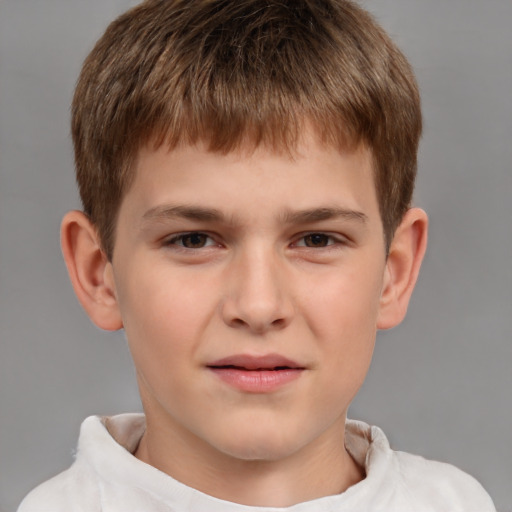 Joyful white child male with short  brown hair and brown eyes