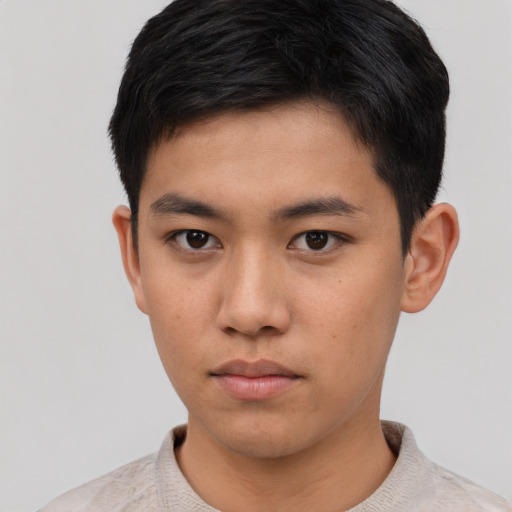 Neutral asian young-adult male with short  black hair and brown eyes