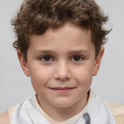 Joyful white child male with short  brown hair and brown eyes