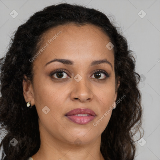 Joyful latino young-adult female with long  brown hair and brown eyes