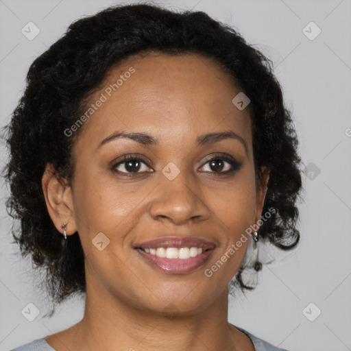 Joyful black young-adult female with medium  brown hair and brown eyes