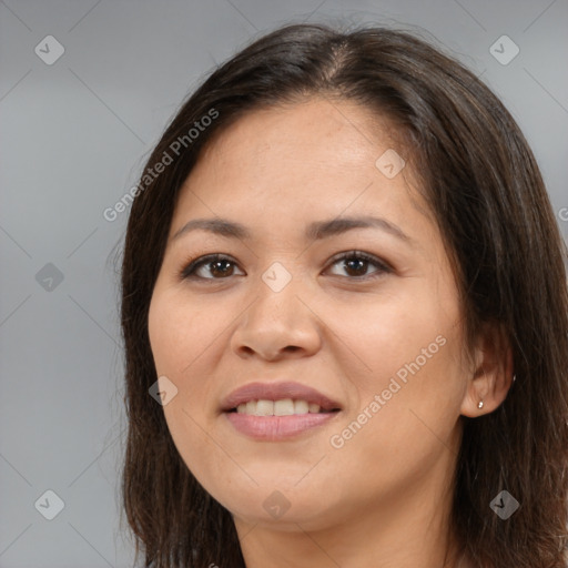 Joyful asian young-adult female with long  brown hair and brown eyes