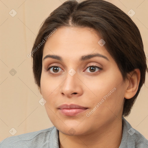 Neutral white young-adult female with medium  brown hair and brown eyes