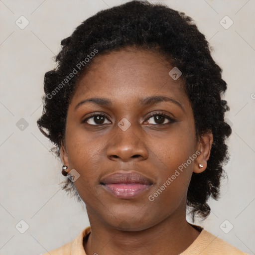 Neutral black young-adult female with short  brown hair and brown eyes