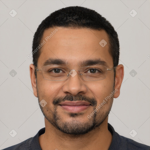 Joyful latino young-adult male with short  black hair and brown eyes