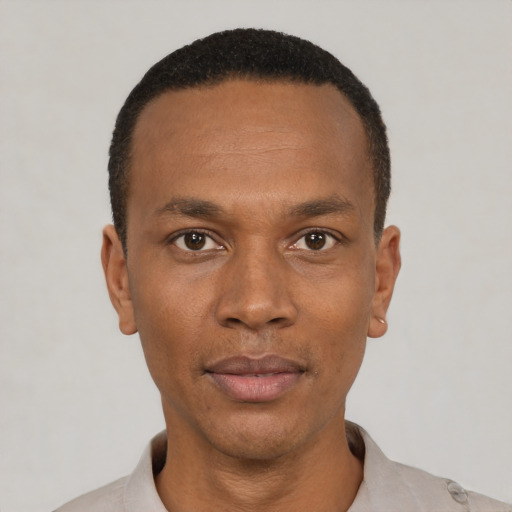 Neutral black young-adult male with short  black hair and brown eyes