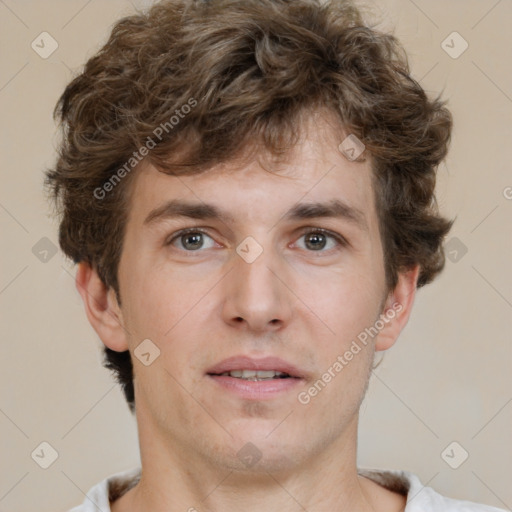 Neutral white young-adult male with short  brown hair and grey eyes