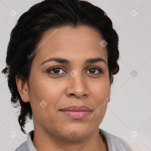 Joyful latino adult female with short  brown hair and brown eyes