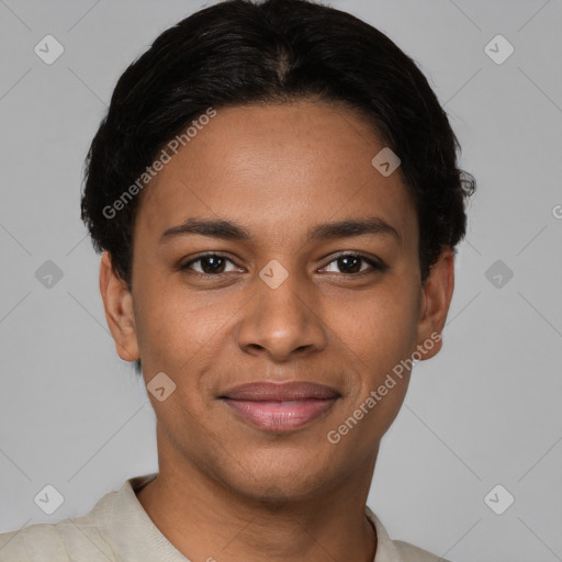 Joyful black young-adult female with short  brown hair and brown eyes