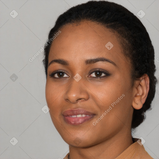 Joyful latino young-adult female with short  black hair and brown eyes