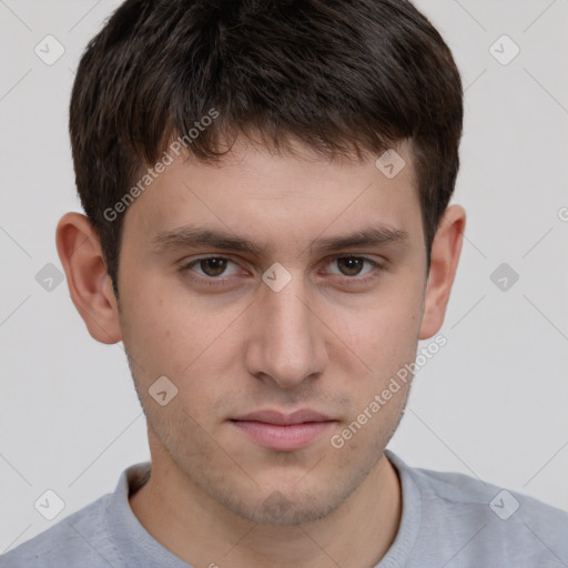 Neutral white young-adult male with short  brown hair and grey eyes