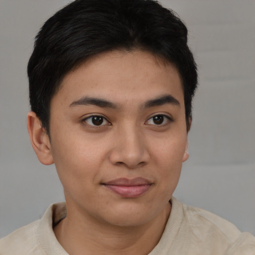 Joyful asian young-adult female with short  brown hair and brown eyes