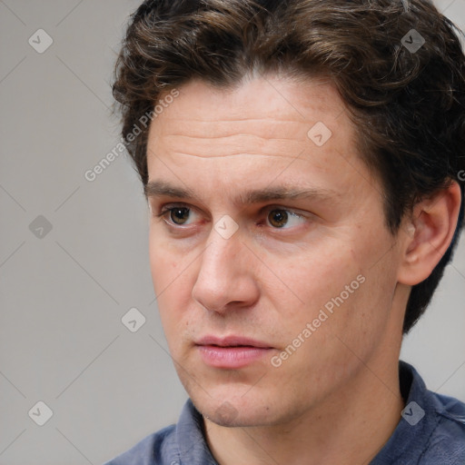 Neutral white adult male with short  brown hair and brown eyes