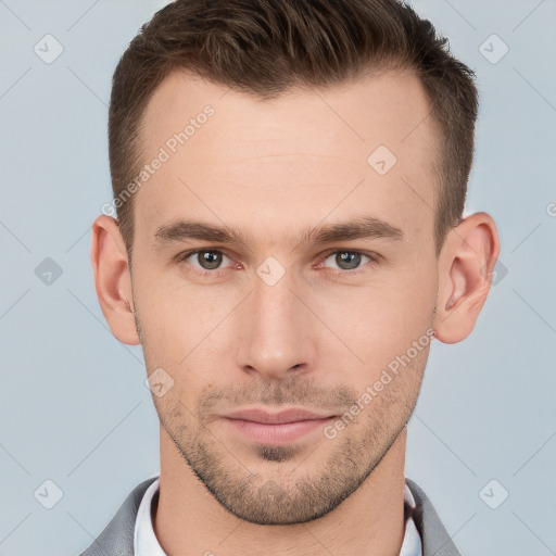 Neutral white young-adult male with short  brown hair and grey eyes