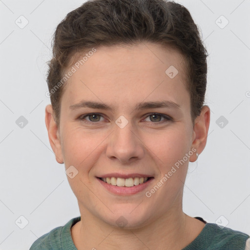 Joyful white young-adult female with short  brown hair and grey eyes