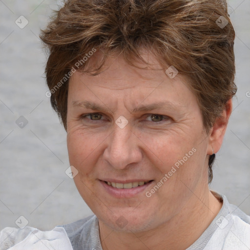 Joyful white adult female with short  brown hair and brown eyes