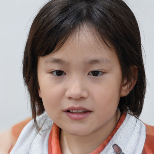 Joyful white child female with medium  brown hair and brown eyes