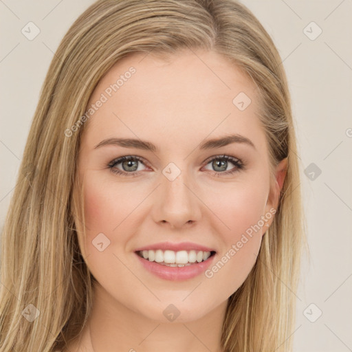 Joyful white young-adult female with long  brown hair and green eyes