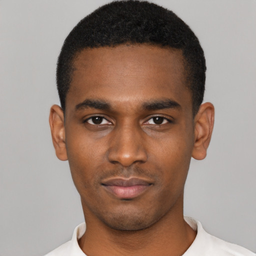 Neutral black young-adult male with short  black hair and brown eyes