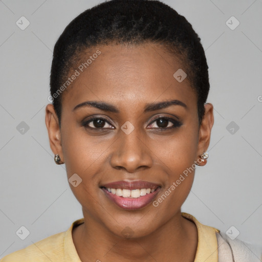 Joyful black young-adult female with short  brown hair and brown eyes