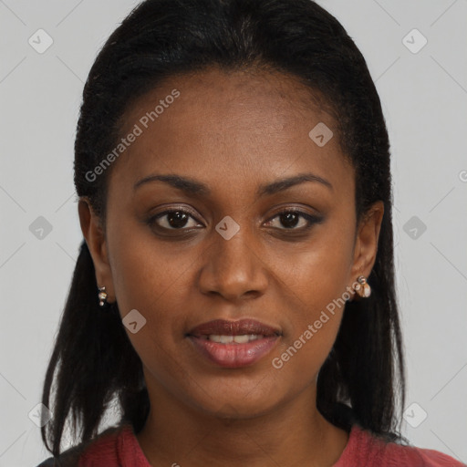 Joyful black young-adult female with long  brown hair and brown eyes
