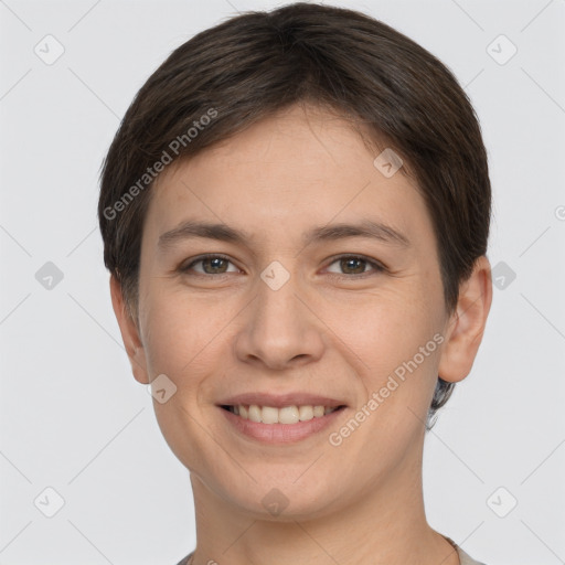 Joyful white young-adult female with short  brown hair and brown eyes