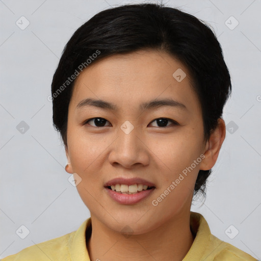 Joyful asian young-adult female with short  brown hair and brown eyes