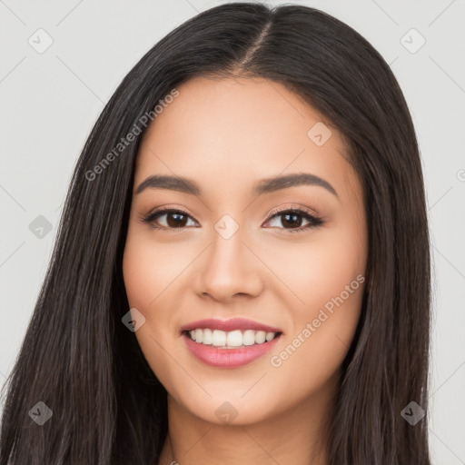 Joyful white young-adult female with long  black hair and brown eyes