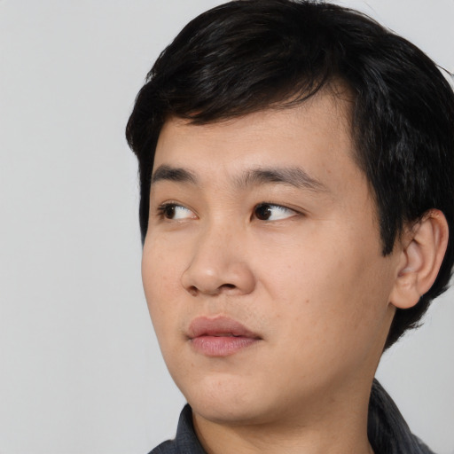 Neutral asian young-adult male with medium  black hair and brown eyes