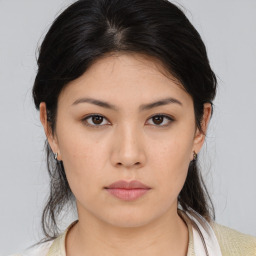 Neutral asian young-adult female with medium  brown hair and brown eyes