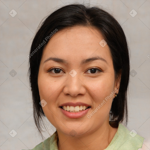 Joyful white adult female with medium  brown hair and brown eyes