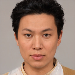 Neutral asian young-adult male with short  black hair and brown eyes
