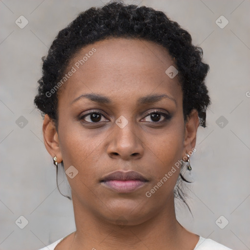 Neutral black young-adult female with short  brown hair and brown eyes