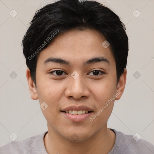 Joyful asian young-adult male with short  black hair and brown eyes