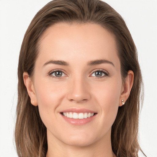 Joyful white young-adult female with long  brown hair and grey eyes