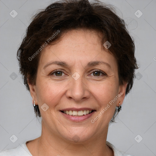 Joyful white adult female with short  brown hair and brown eyes