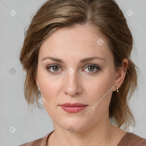 Joyful white young-adult female with medium  brown hair and green eyes