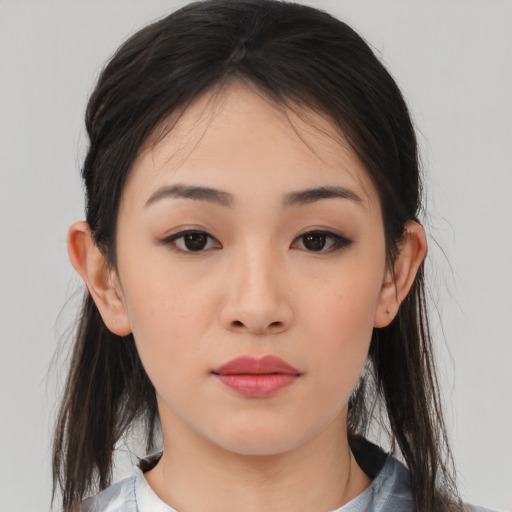 Neutral asian young-adult female with medium  brown hair and brown eyes