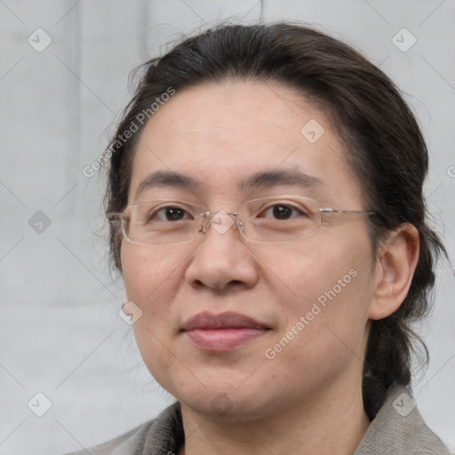 Joyful white adult female with medium  brown hair and brown eyes