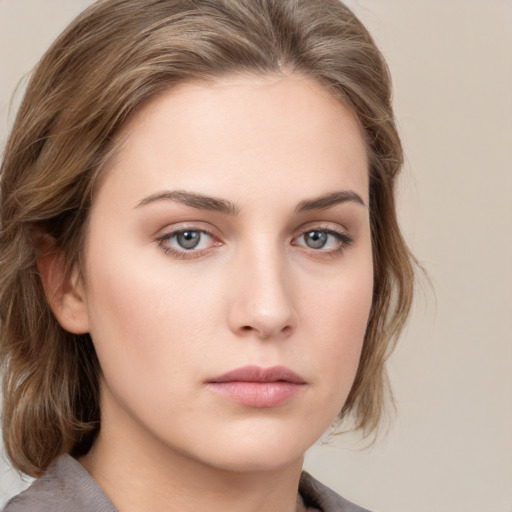 Neutral white young-adult female with medium  brown hair and grey eyes