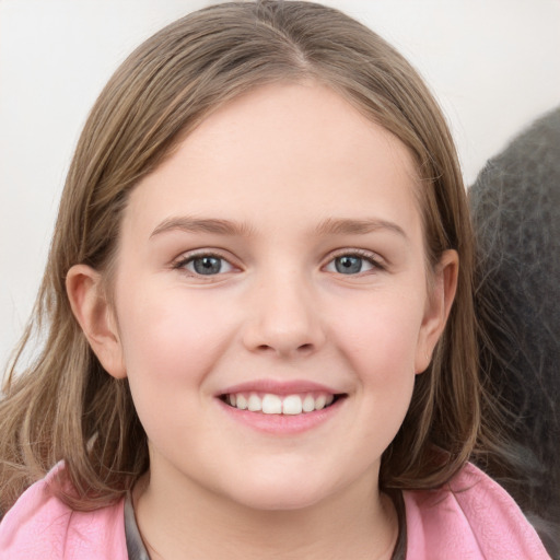 Joyful white child female with medium  brown hair and grey eyes